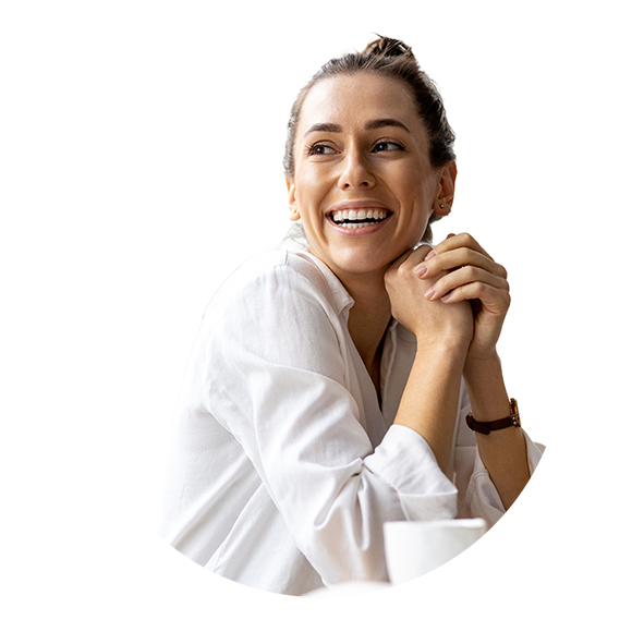 Woman smiling with clasped hands