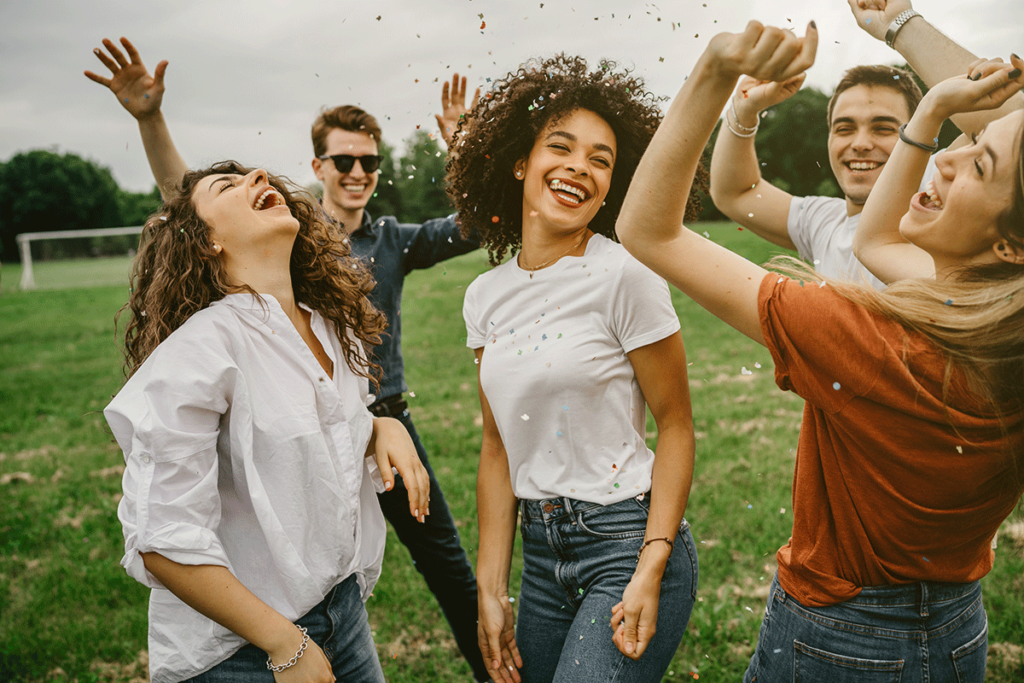 people outdoors having fun while staying sober from alcohol