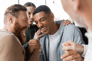 man receives support from peers in benzo addiction rehab